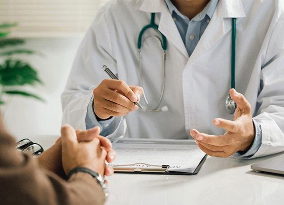 medical consultation with doctor and patient discussing health records and treatment options 3 tips for health